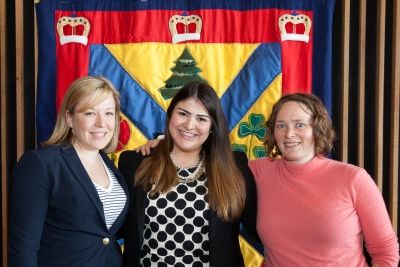 Naheed Yaqubian (middle), Law '14, with classmates and supporters Joanna Hunt and Ann Clifford at the Tricolour Society reception in the Isabel Bader Centre for the Performing Arts.