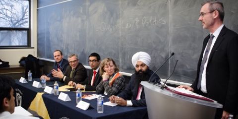 Dean Bill Flanagan (far right), at the Law & Politics panel in Macdonald Hall on Jan. 20, introduces panelists Nathanial Erskine-Smith, MP, Law’10; Tony Clement, MP; Andy Singh, Law’10; Lynne Golding, Law‘87; and Randeep Sarai, MP, Law’01.
