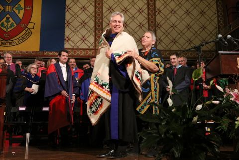 John Borrows, a leading Canadian Indigenous legal scholar (shown being presented with a Creation Turtle Pendleton Blanket as he received an honorary degree from Queen’s University at the Fall 2019 Convocation), will present the keynote address at the Queen’s Conference on Indigenous Reconciliation on March 6.