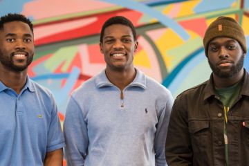 BLSA-Queen’s President Nigel Masenda, Law’20 (middle), speaks with Rasheed Tucker (Com’21), and David Oteng Pabi (Artsci’21), about ways the Black Law Students’ Association can help address the lack of representation in some other professions in addition to law.