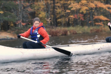Students in Professor Lindsay Borrows’ Indigenous Law in Practice class practice the Indigenous legal method of drawing out law from nature while canoeing on Elbow Lake. 