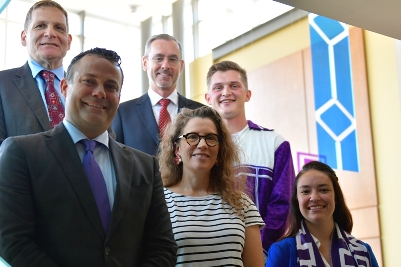 Speakers at the Indigenous art installation unveiling: (back row, l-r) Principal Daniel Woolf, Dean Bill Flanagan and Brandon Maracle, Law'21; (front row, l-r) David Sharpe, Law'95, Hannah Claus and Shelby Percival, Law'20. (Photo by University of Communications)