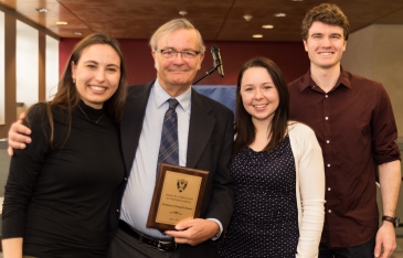 Professor Don Stuart accepts his Stanley M. Corbett Award for Teaching Excellence from nominators Alexandra Terrana, Law’17, Erika Hodge, Law’17, and Paul Socka, Law’18.