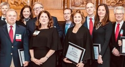 Associate Dean (Academic) Erik Knutsen (far left) became one 18 Fellows inducted into the American College of Coverage Counsel.