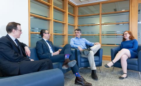 Winter 2018: Professor Art Cockfield (2nd right) discusses the latest hot topic in corporate law with Professors Rob Yalden, Mohamed Khimji, and Gail Henderson in the faculty lounge.