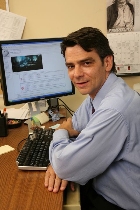 Spring 2008: From his office in the Queen’s Law building, Professor Art Cockfield, Law’93, works on a privacy law project.