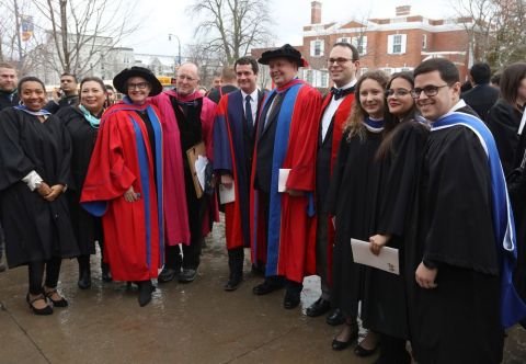 Dean Mark Walters, Law’89 (5th left), poses with faculty, staff and some new law grads outside Grant Hall on November 14. Dean Mark Walters, Law’89 (5th left), poses with faculty, staff and some new law grads outside Grant Hall on November 14.