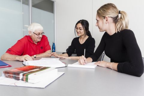 Fall 2018: A Kingston-area senior receives free legal advice from Queen’s Elder Law Clinic student caseworkers in the downtown Queen’s Law Clinics office. (Photo by Greg Black) Fall 2018: A Kingston-area senior receives free legal advice from Queen’s Elder Law Clinic student caseworkers in the downtown Queen’s Law Clinics office.
