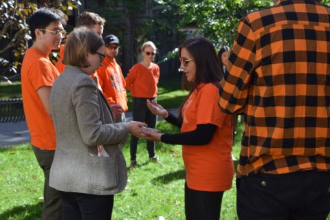 EDII Director Stacia Loft starts the Blanket Exercise by performing a smudging ceremony, during which she burned medicinal herbs, guiding the smoke onto participants’ hands, and praying for the negative energy to leave and the positive energy to remain.  