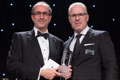 Peter Brady, Law’96 (right), receives the CGCA for Litigation Management from David Ross of McMillan LLP at the award ceremony held at the Fairmont Royal York in Toronto