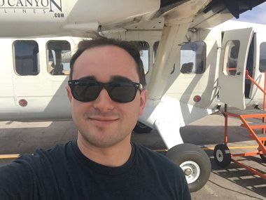 Avery Campbell, Law’16, at a Nevada airport before taking off on a flight to the Grand Canyon.