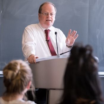 Justice Thomas Cromwell, Law’76, recently retired from the Supreme Court of Canada, speaks in Macdonald Hall about access to justice. (Photo by Andrew Van Overbeke)