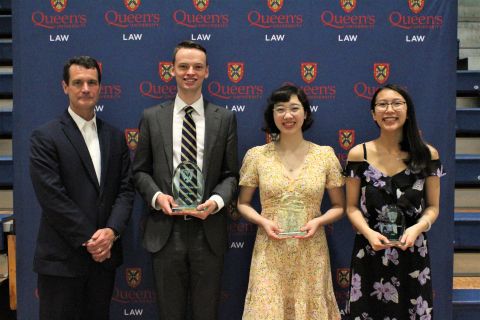 Dean Walters with recipients of the Dean’s Scholar Awards, given to the graduates with the highest third-year averages: Andrew Irwin (Gold Scholar), Christina Tang (Silver Scholar), and Iris Ngo (Bronze Scholar). 