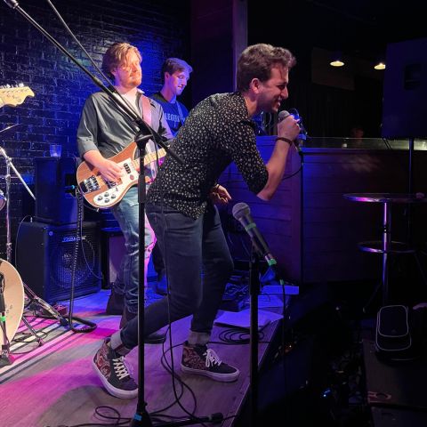 Belting out a tune at Lawlapalooza is Nathaniel Zev Winegust, Law’25, with The Reasonable Men bandmates and Law’23 classmates Liam Prymak and Stuart Gordon. Belting out a tune at Lawlapalooza is Nathaniel Zev Winegust, Law’25, with The Reasonable Men bandmates and Law’23 classmates Liam Prymak and Stuart Gordon.