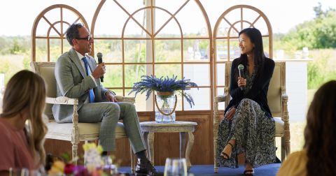 At the QBLP Garden Party last spring, Associate Dean Mohamed Khimji asks keynote speaker Alice Lin, Law’13, Senior Corporate Counsel with San Diego’s Workday, Inc., to share her advice about career opportunities in New York and California. (Photo by Eightbyten)