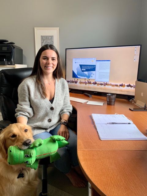 Shira Crawley, Law’21, shown in her Ottawa home with officemate Stella, interns remotely with the Ottawa-based National Association of Friendship Centres to prioritize recommendations having a greater and positive impact on the lives of Indigenous people within the Canadian justice system. 