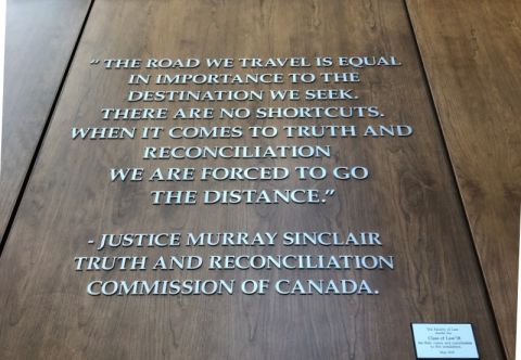 The Queen’s Law atrium now features a short but powerful quote by Senator Murray Sinclair, Chief Commissioner of the Truth and Reconciliation Commission of Canada, thanks to a class gift by Law’18. The words will “provide a daily reminder to law students that the journey of reconciliation is far from over, and that they have an important role to play in maintaining its momentum.”  