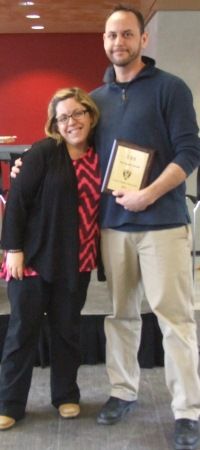 Ashley Pitcher, Law’17, presents the 2016 LSS Spark Award to Jason Mercredi, Law’18, LSS Aboriginal Student Representative, on March 28.