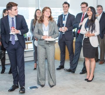 Alumni and incoming students share a laugh at the annual Queen’s Law reception in Vancouver.