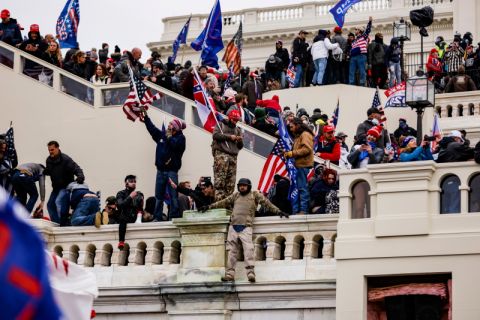 Washington, D.C., January 6: Hundreds of Trump supporters raid the U.S. Capitol building moments after attending a rally at which the outgoing president repeated false claims of widespread voter fraud in the November elections.