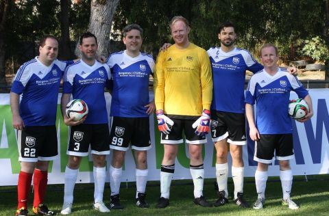 The “Bergeron Clifford Eastern Ontario” team on the playing field in Santiago: Warren WhiteKnight, Law’13 (second right), Kyle Shimon, Law’14, Gavin Cosgrove, Ross Pryde, Andrew Howard and Cormac Trainor.