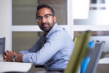 Manoj Dias-Abey, PhD’16, who says, “Both the research and teaching experience I obtained at Queen’s were instrumental in me getting my first academic position,” has joined the University of Bristol School of Law. (Photo by Greg Black)