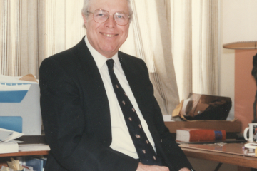 Professor Ronald R. Price, shown in his Queen’s Law office (circa 1980s).