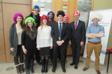 Queen’s Law’s “Flip Your Wig” student ambassador Cam Rempel, MPA’15/Law’18 (right) with fellow students, Professors Jean Thomas and Grégoire Webber, and Dean Bill Flanagan (2nd right).