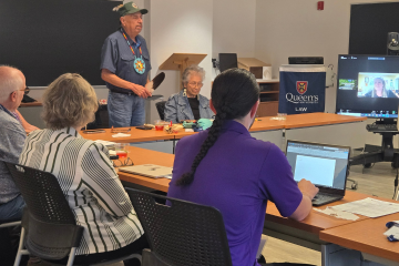 Elder Darrell Boissoneau provides opening remarks for “Widespread and Systematic – A Symposium on Crimes Against Humanity and Indigenous Peoples,” an event co-organized by Professor Kimberly Murray at Queen’s Law.  