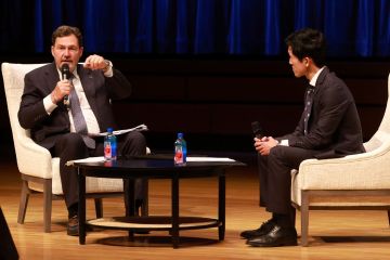 The Right Honourable Richard Wagner, P.C., Chief Justice of Canada, discusses access to justice and the role of lawyers in public service during a fireside chat with Professor Preston Lim as part of the Queen’s Law Orientation on Sept. 9 at the Isabel Bader Centre for the Performing Arts. (Photo by Bernard Clark)