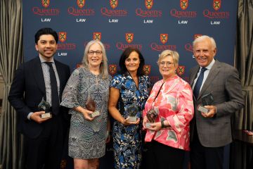 Recipients of the 2026 Queen’s Law alumni awards: Brandon Chung, Law’17; Kelley McKinnon, Law’88; Judy Goldring, Law’91; Justice Lucille Shaw, Law’89; and Donald Bayne, Law’69. (Photo by Michael Tenaglia)