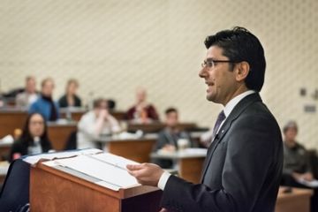 Attorney General Yasir Naqvi speaks to Queen’s Law students in Macdonald Hall on February 8.