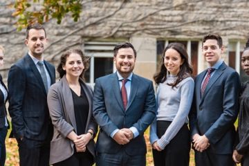 Osler lawyers and summer students in the Queen’s Law courtyard before the “Demystifying Business Law” workshop on October 30: (l-r) Isabelle Crew, Law’18, Brandon Kerstens, Law’14, Allison Di Cesare, Law’14, Patrick Welsh, Law’10, Arielle Kaplan, Law’15, Elie Farkas, Law’17, and Stella Gore, Law’18. (Photo by Andrew Van Overbeke)