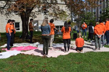 ILSA co-chair Carolyn Alexander, Law’23, narrates a Blanket Exercise for Queen’s Law community members on September 30 in recognition of the National Day for Truth and Reconciliation. 