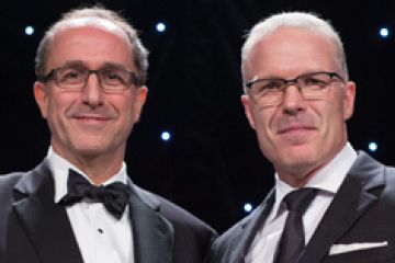 Peter Brady, Law’96 (right), receives the CGCA for Litigation Management from David Ross of McMillan LLP at the award ceremony held at the Fairmont Royal York in Toronto