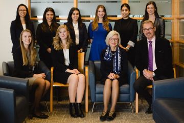 Chief Justice Beverley McLachlin and Dean Bill Flanagan with Queen’s Women in Law executive members during a reception in faculty lounge on November 20. (Photo by Tim Forbes)