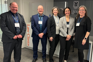 Queen’s Law Clinic students and directors thank Cunningham Swan Carty Little & Bonham LLP representatives for the firm’s $100,000 donation at a reception on Nov. 13. 
