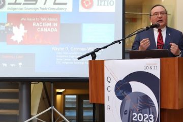 Wayne Garnons-Williams, Law’90, who had played a key role in negotiating the Indigenous Peoples Economic and Trade Cooperation Arrangement (IPETCA), presents the opening keynote address at the 2023 Queen’s Conference on Indigenous Reconciliation (QCIR) that focused on “Sustainable Pathways to Reconciliation.”