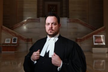 Eric Gottardi, Law’02, in the grand foyer of the Supreme Court of Canada. (Photo by John Major)
