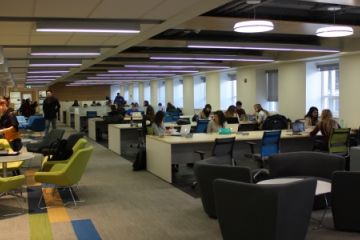 Queen’s Law students go about their studies in the school’s new Learning Commons.