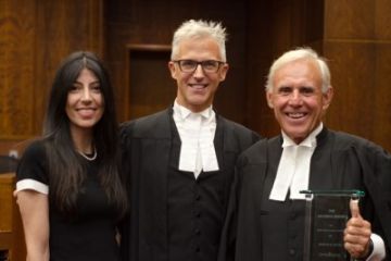 Donald B. Bayne, Law'69 (far right), accepts the Catzman Award from Julie Catzman and Bradley E. Berg, President of The Advocates’ Society, during the Opening of the Courts for Ontario ceremony in Toronto on September 13. (Photo by The Advocates’ Society)