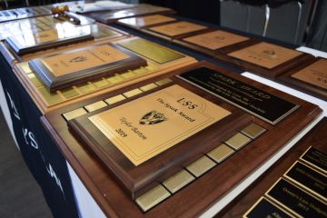 A close-up shot of award plaques 