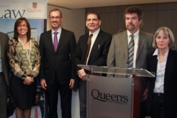 Photo by Bernard Clark. Pictured (l-r) at the grand opening of the Queen’s Law Clinics: Tanya Lee, Director, Policy and Programs, Law Foundation of Ontario; Christian Hurley, QBLC and QELC Director; Karla McGrath, QFLC Director; Dean Bill Flanagan; Principal Daniel Woolf; Randall Ellsworth, VP, Legal Aid Ontario, Northern, Central & Eastern Regions; Elizabeth Thomas, QPLC Director; and Jana Mills, QLA Acting Senior Review Counsel.