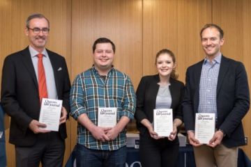 Dean Bill Flanagan, QLJ co-editors-in-chief Graham Bevans and Isabelle Crew and faculty advisor Professor Grégoire Webber at the QLJ Fall 2017 issue launch in the student lounge on January 22. (Photo by Andrew Van Overbeke)