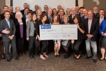 Law’80 classmates with Dean Bill Flanagan (back row, far right) at their Homecoming dinner held in the Donald Gordon Centre, where their $250,000 cheque was presented.