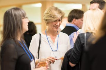 3 women networking at Queen's 2016 Homecoming