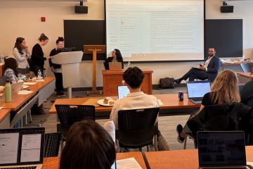 Students in the QBLC workshop present trademark search results to trademark experts Jamie-Lynn Kraft and Robert Maratta during the clinic’s first Trademarks Workshop.