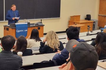 Supreme Court Justice Malcolm Rowe explains to students and faculty how he harbors no doubts about the ability and willingness of this country’s legislatures and courts to respond to changing public needs in fair and equitable ways. 