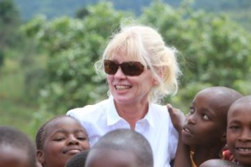 Fiona Sampson, Law'93, visits beneficiaries of the 160 Girls Project at Ntani Primary School in Nairobi on Jan. 14. (Photo by Brian Jaybee)