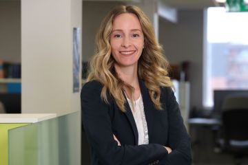 Sarah Forsyth, Law’15, loves her work as a review counsel at Queen’s Legal Aid, where she supervises students and helps low-income clients deal with a range of legal issues. (Photo by  Bernard Clark)